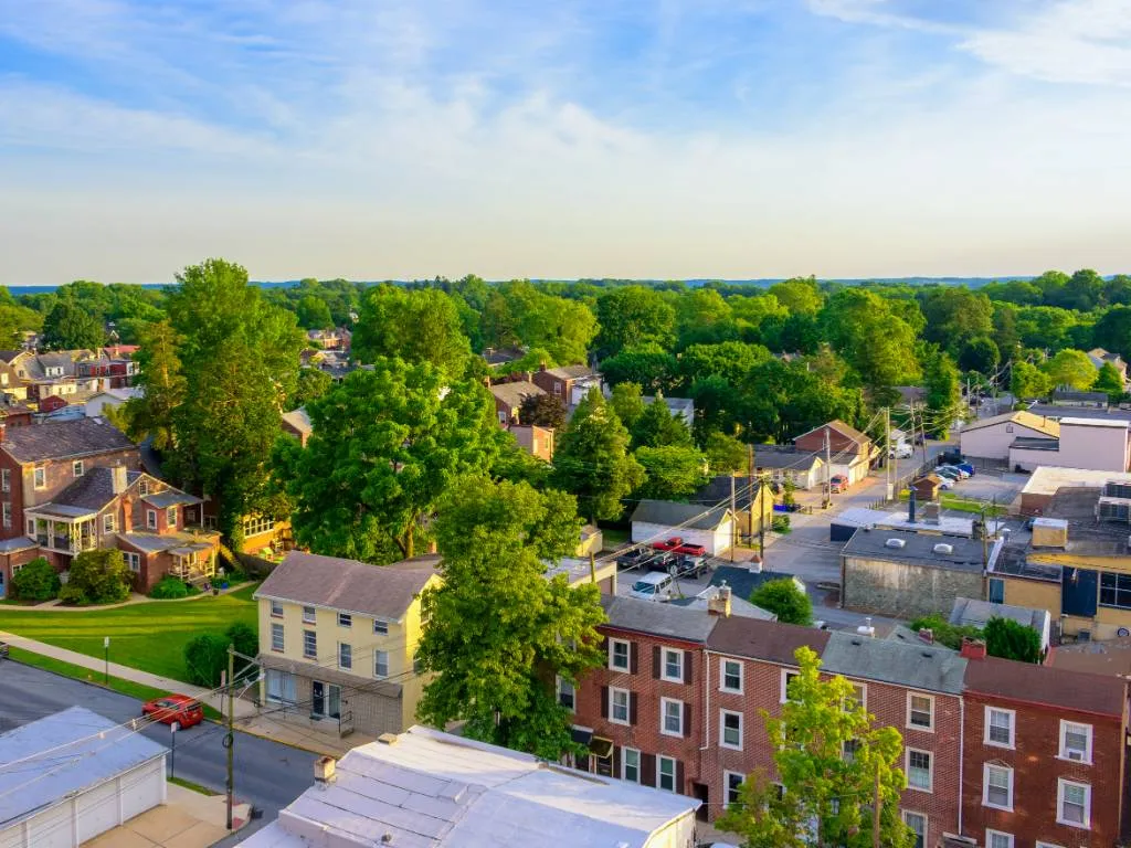 Aerial view of West Chester, Pennsylvania neighborhoods with tree-lined streets and Chester County homes